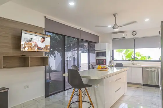 Kitchen, island and living beyond